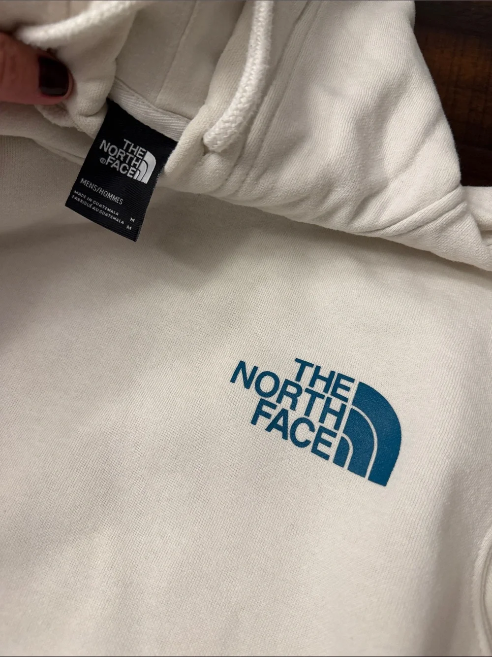The North Face Men's Cream Hoodie with Blue Logo